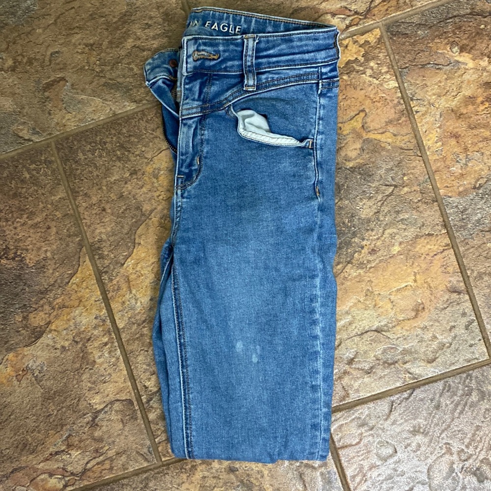American eagle skinny jeans (fairly worn) bleach spots on thigh